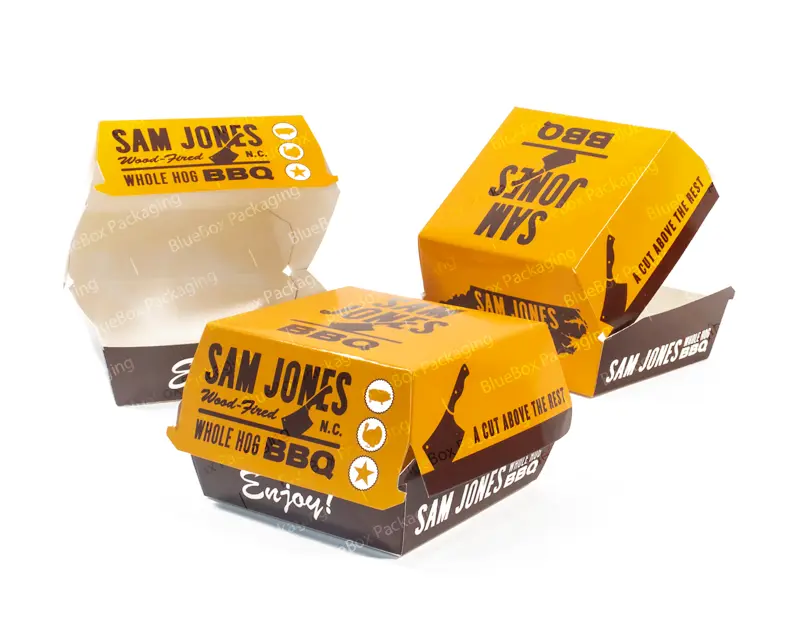 Custom burger boxes with a sleek design, showcasing eco-friendly packaging and vibrant branding.
