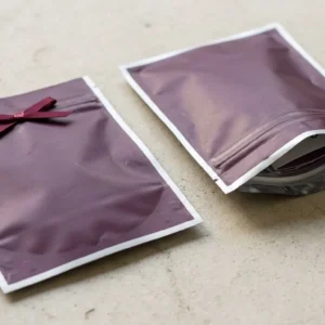 Custom Child Resistant Blunt Packaging, closed and open view in deep plum, bulk and wholesale with no minimum order