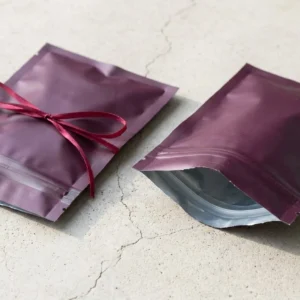 Custom Mylar Ziplock Bags, closed and open view in deep plum, bulk and wholesale with no minimum order