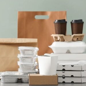 Custom togo boxes in kraft and white, a matching range of food containers, cups and carry bags.