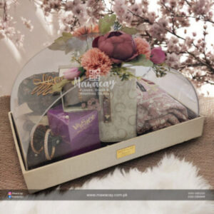 Custom wedding gift box with a clear lid, holding flowers and a gift arranged inside the tray.