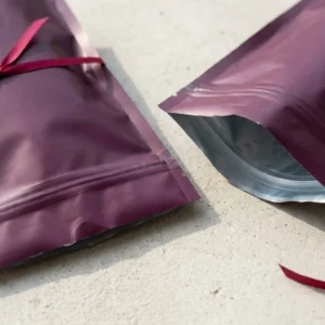 Custom Zipper Mylar Pouches, closed and open view in deep plum, bulk and wholesale with no minimum order